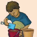 child with sand bucket
