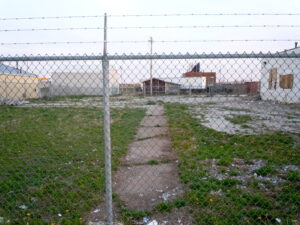 Fenced vacant lot
